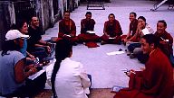 A circle group outside, during the warmer months.